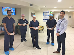 Cairns Private Hospital CEO Ben Tooth with staff who dined on meals from Ochre Restaurant